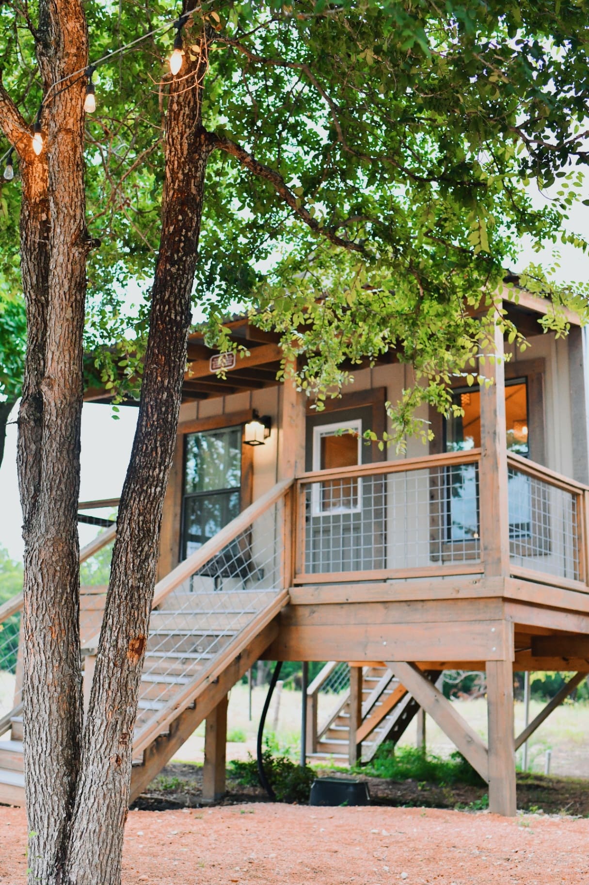 Riverfront cabin rental porch with rocking chairs in the Texas Hill Country near San Antonio