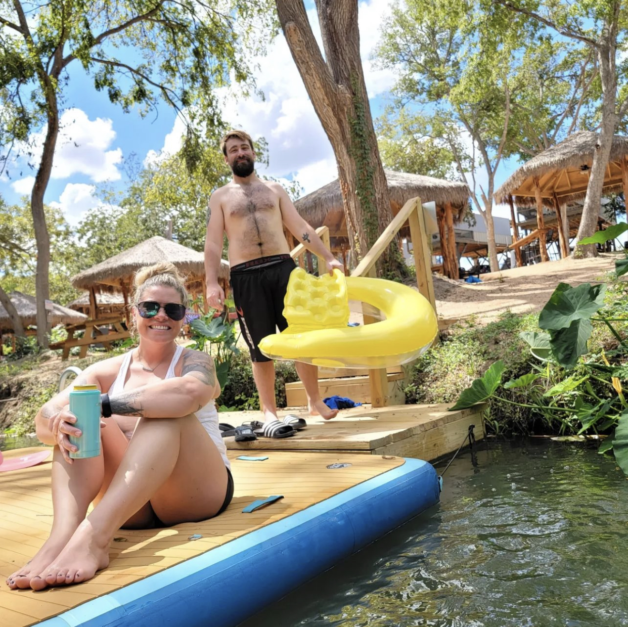 Couple relaxing on the dock at Cibolo Creek