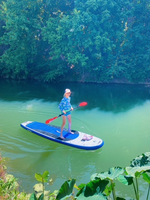 Paddleboarding on the creek